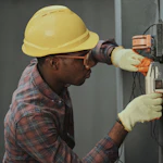 Electrician in safety glasses